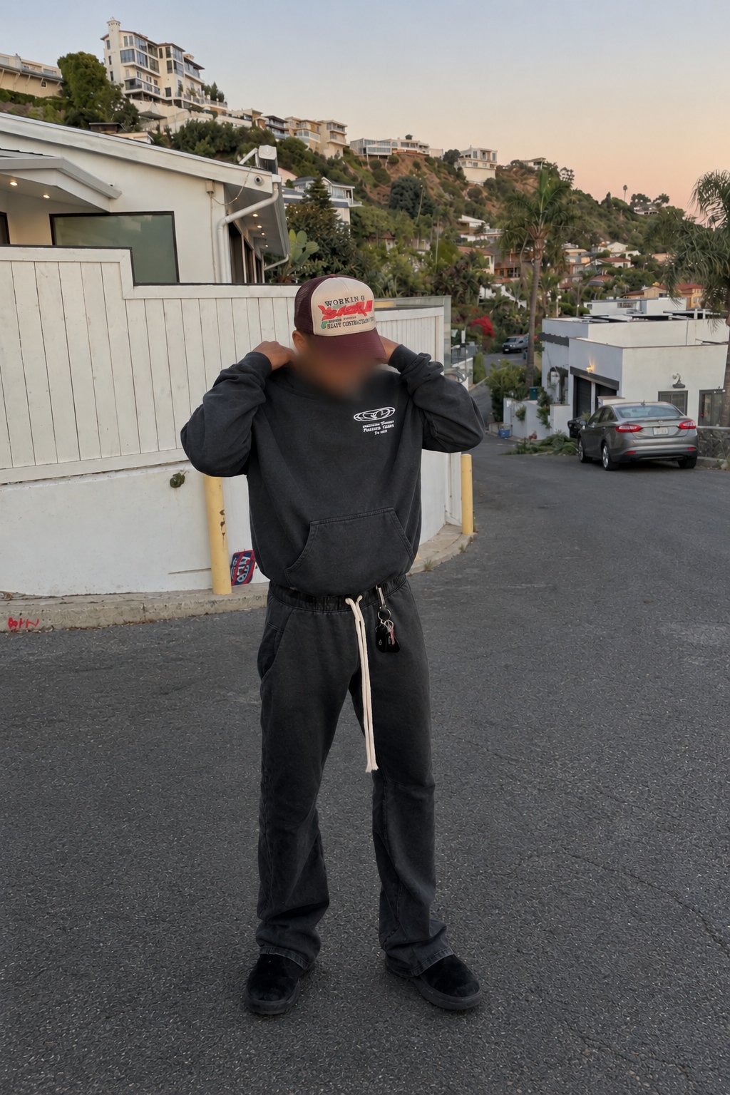 Front view of the charcoal Tuff Love hoodie
